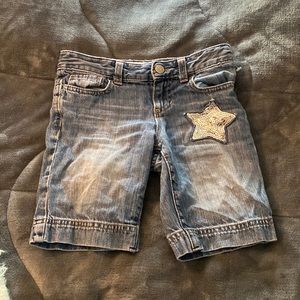 A girls pair of old navy jean shorts super cute and great for the summer.